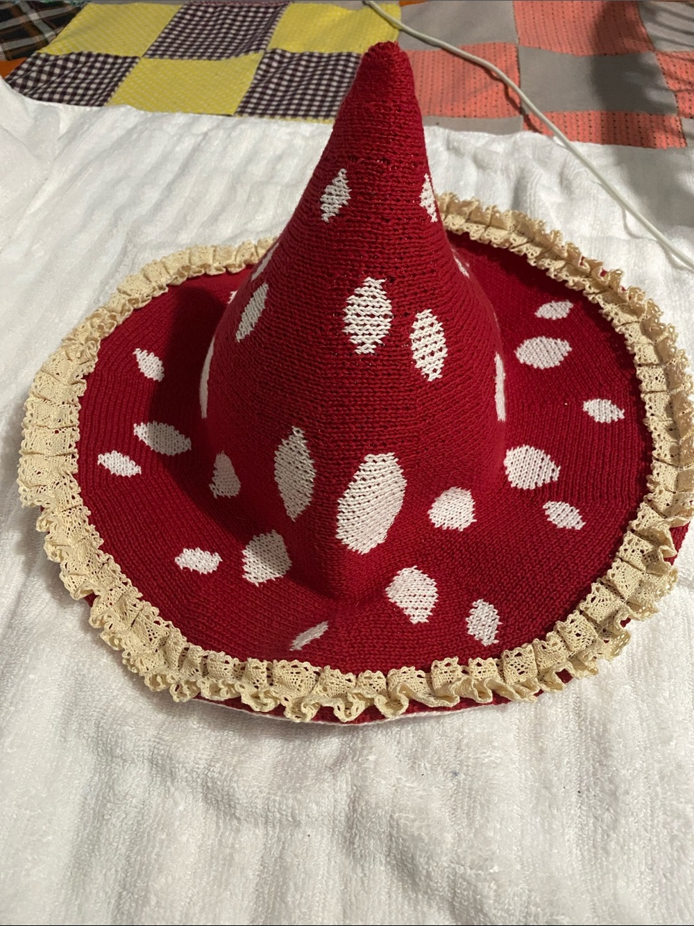Red Knit Pointed Hat with Cream Spots and Lace Trim